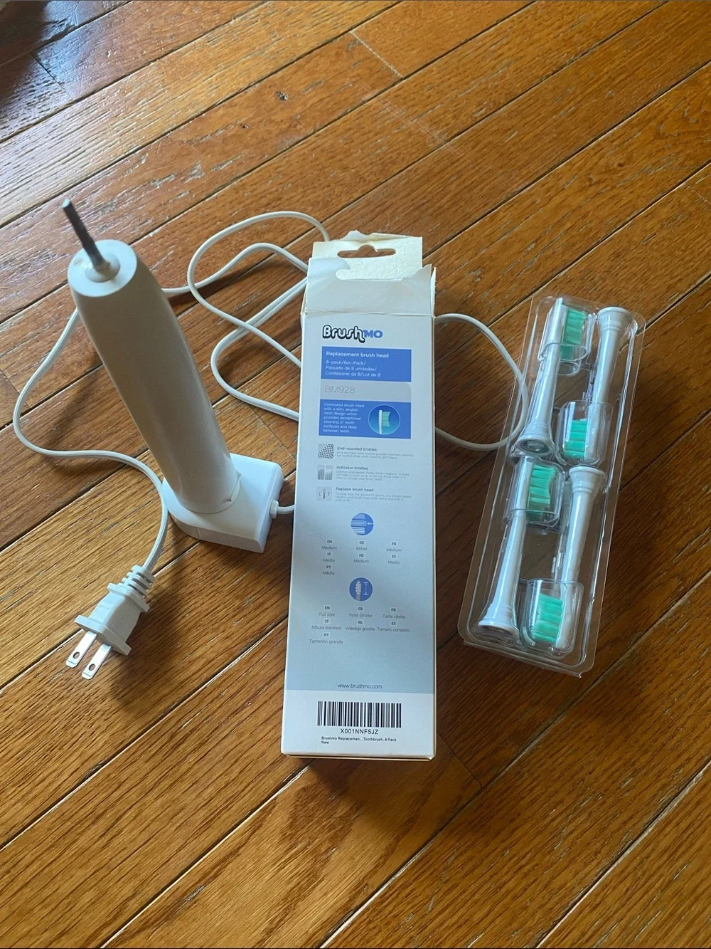 Philips Sonicare White Electric Toothbrush Handle with Replacement Brush Heads